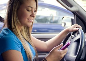 teen-girl-texting-while-driving-pv